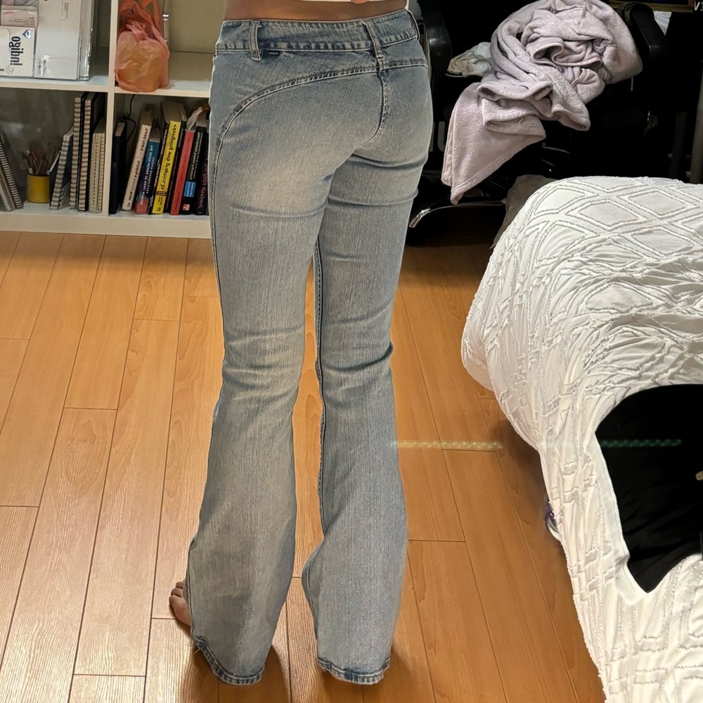 Super low rise, light wash bootcut jeans